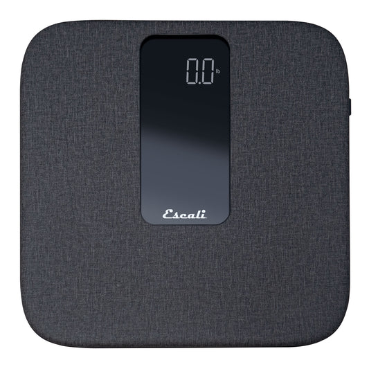 A photo of a ComfortStep Bathroom Scale on a white background, featuring a stylish and comfortable linen surface.